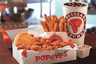 Popeyes West Mobile Logo